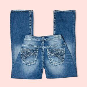 Y2K cropped jeans with wings on the back pockets